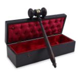 Blackened wooden gavel in accompanying box