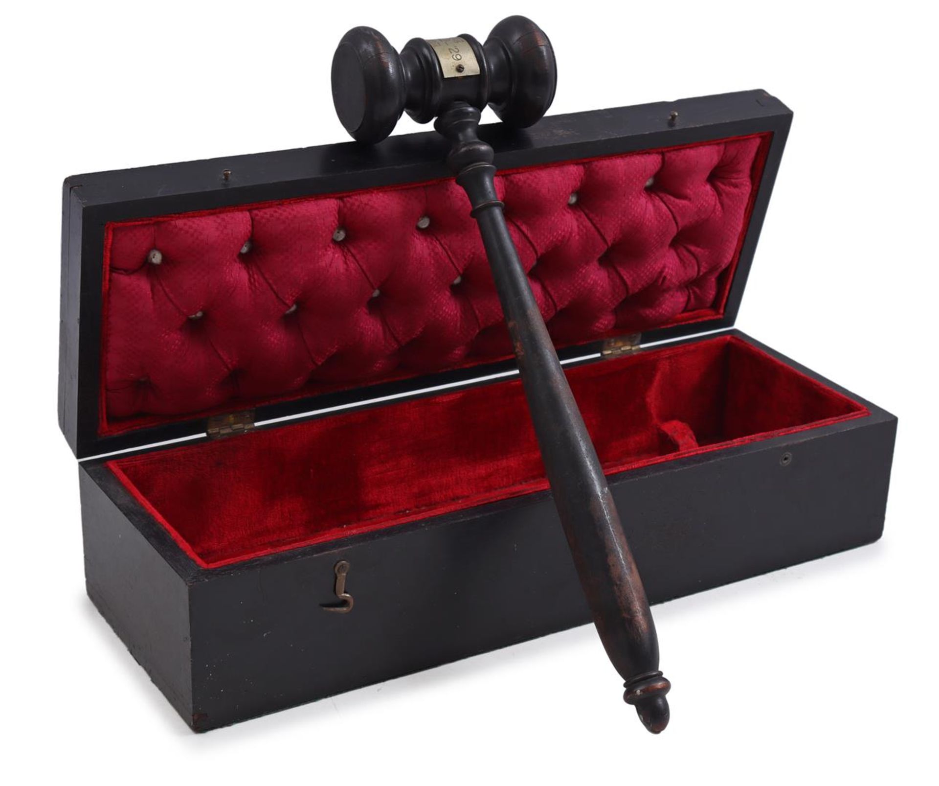 Blackened wooden gavel in accompanying box