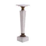 White marble pedestal with copper bands