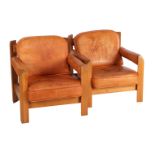 Teak armchairs