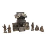 Metal pagoda with 5 oriental figures