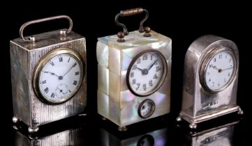 3 old travel alarm clocks