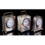 3 old travel alarm clocks