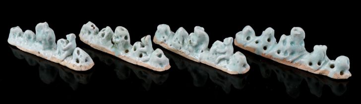 4 porcelain green glazed sculptures