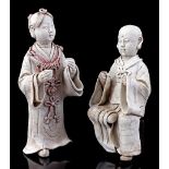 2 porcelain statues of monks