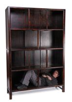 Blackened wooden cabinet with 10 open compartments