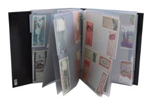 various UNC banknotes in album
