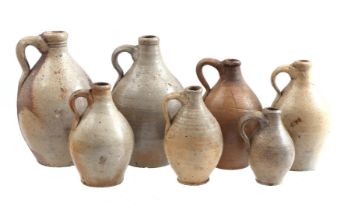 7 stoneware jars
