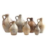 7 stoneware jars