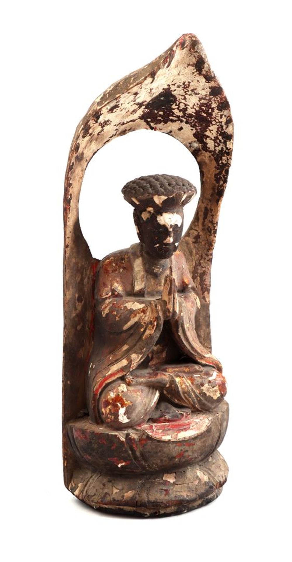 Wooden sculpture of a praying philosopher