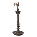 Standing oriental bronze oil lamp