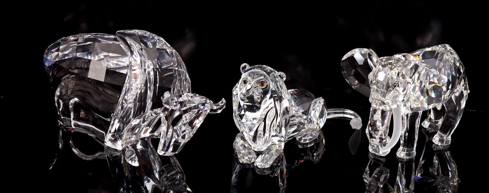 3 Swarovski statues