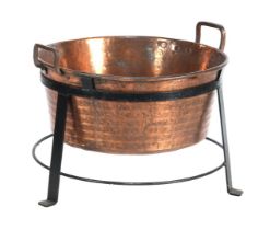 Copper aker in wrought iron holder