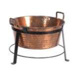 Copper aker in wrought iron holder