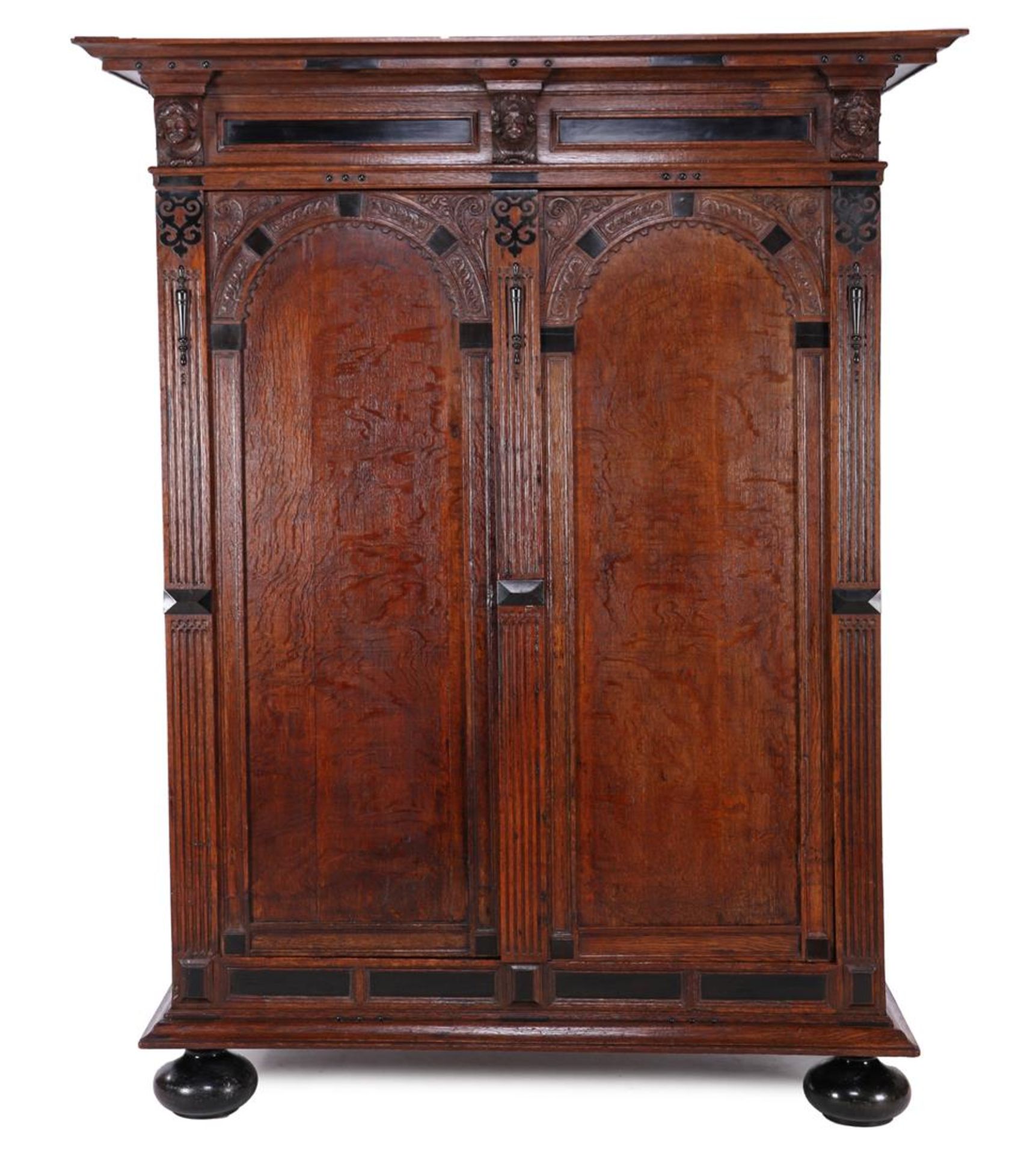 Oak Renaissance-style arch cabinet