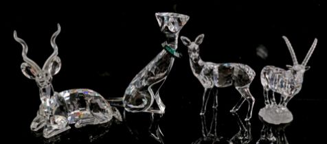 4 Swarovski statues