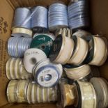 OVER 100 RIBBONS IN VARIOUS COLOURS, DESIGNS AND SIZES IN MIX CONDITIONS- SALEROOM AT BOTTOM OF RACK