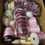 OVER 100 RIBBONS IN VARIOUS COLOURS, DESIGNS AND SIZES IN MIX CONDITIONS- SALEROOM AT BOTTOM OF RACK