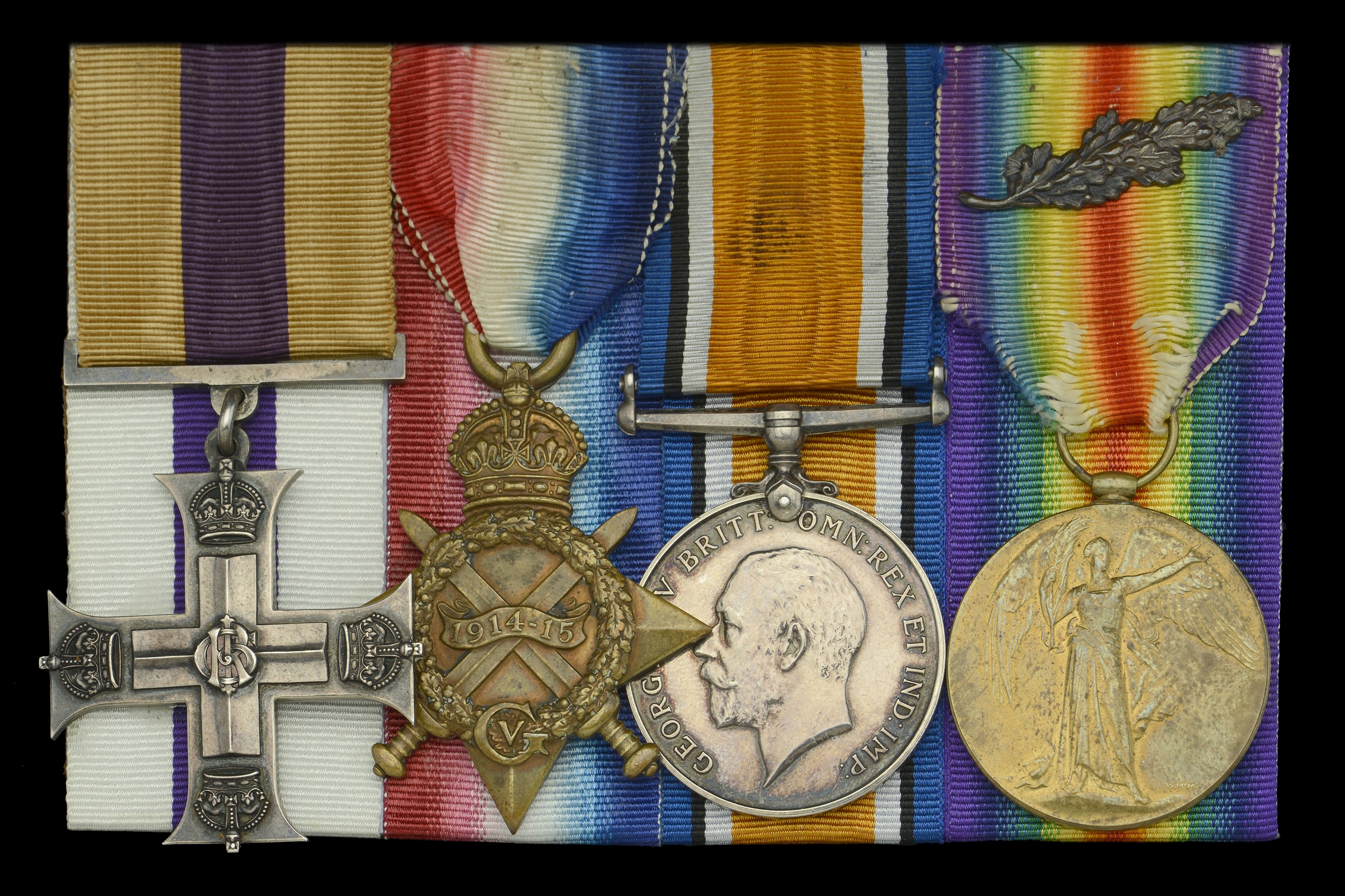 An early and rare Great War 'Defence of Great Britain' M.C. group of four awarded to Captain...