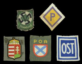 German Second World War Foreign Volunteer and Workers' Shields. Printed blue on white Ost....