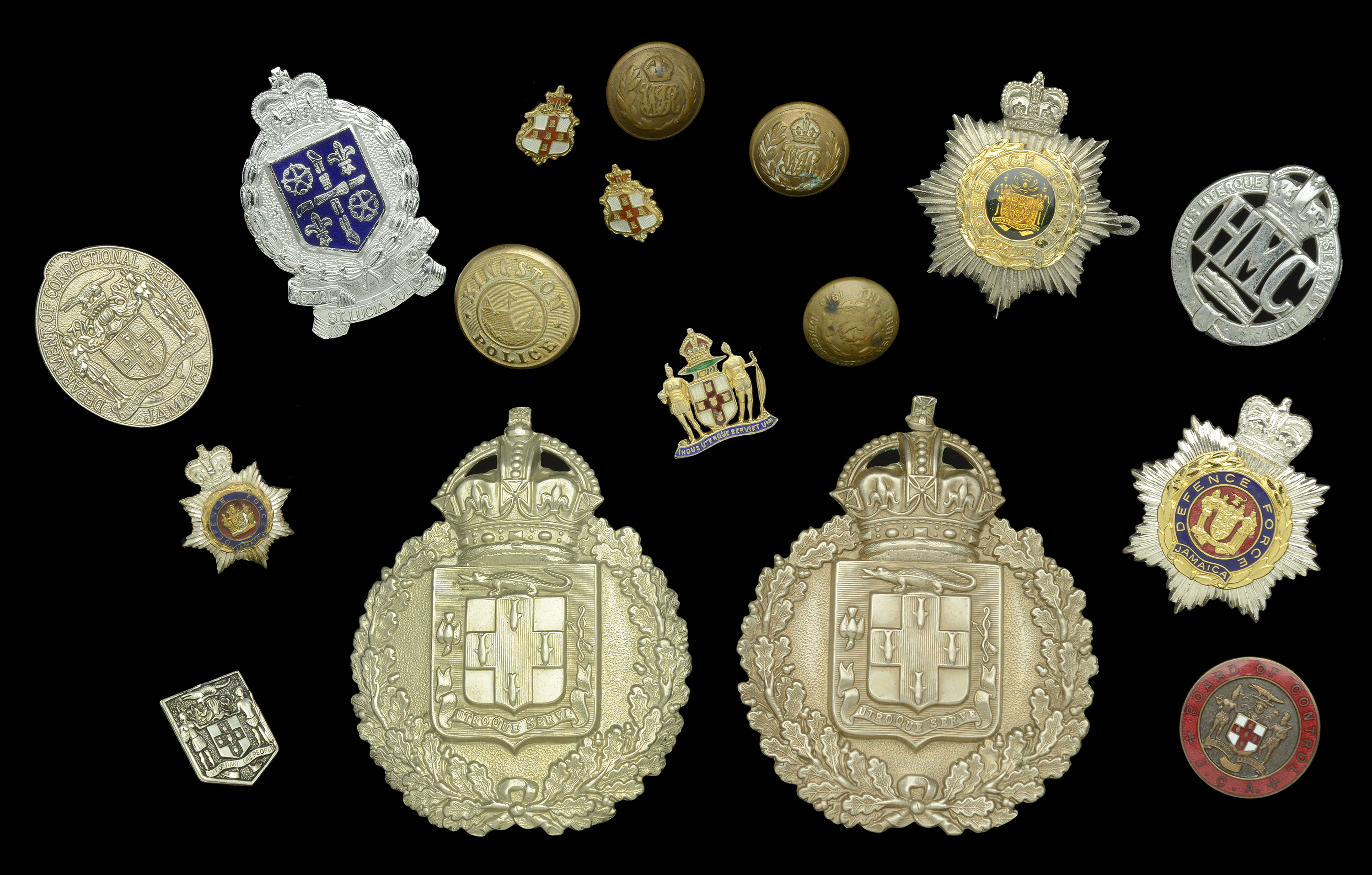 West Indies Police Insignia. A small selection including, Jamaica, two Police helmet plates...