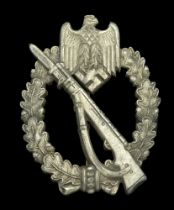 A Silver Infantry Assault Badge. Thin nickel pin, maker's mark 'MK' in triangle [said to be...