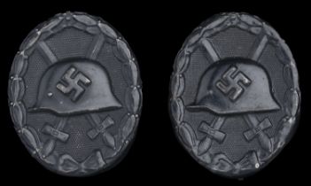 1939 Black Wound Badges. Two examples, the first by Richard Simm and Sohne. Very good quali...