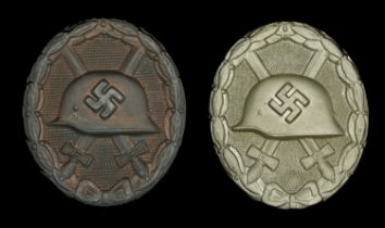 German Second World War Wound Badges. Two interesting Wound Badges, a mint example in black...