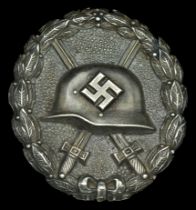 A M.1936/1939 Transitional Spanish Civil War/ Second World War Wound Badge in Silver. A sca...