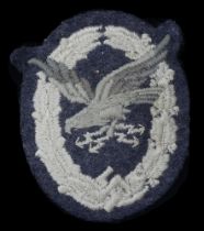A Luftwaffe Radio Operator's/Air Gunner's Badge. Cloth type for other ranks. Luftwaffe blue...