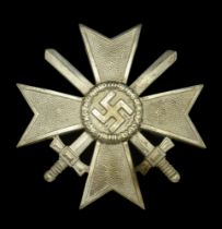 A War Service Cross First Class with Swords. An unusual convex shaped variant. Excellent qu...