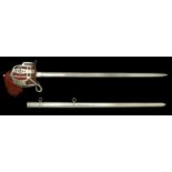 A Scottish 1865 Pattern Broadsword. A fine example, the 83cm blade etched with thistle and...