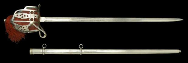 A Scottish 1865 Pattern Broadsword. A fine example, the 83cm blade etched with thistle and...