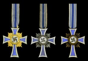 Germany, Third Reich, Mothers Cross (3), First Class in Gold, gilt and enamel; Second Class...