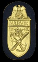 A Narvik Shield, Kriegsmarine Type. A superb example with bright gold lacquered finish, wit...