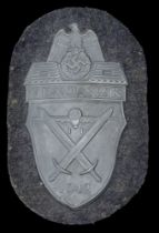 A German Second World War Demjansk Battle Shield. A Luftwaffe Denjansk Shield, which has lo...