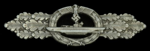 A Kriegsmarine U-Boat Clasp in Bronze. A 1st type example with scooped-out back. Raised mak...