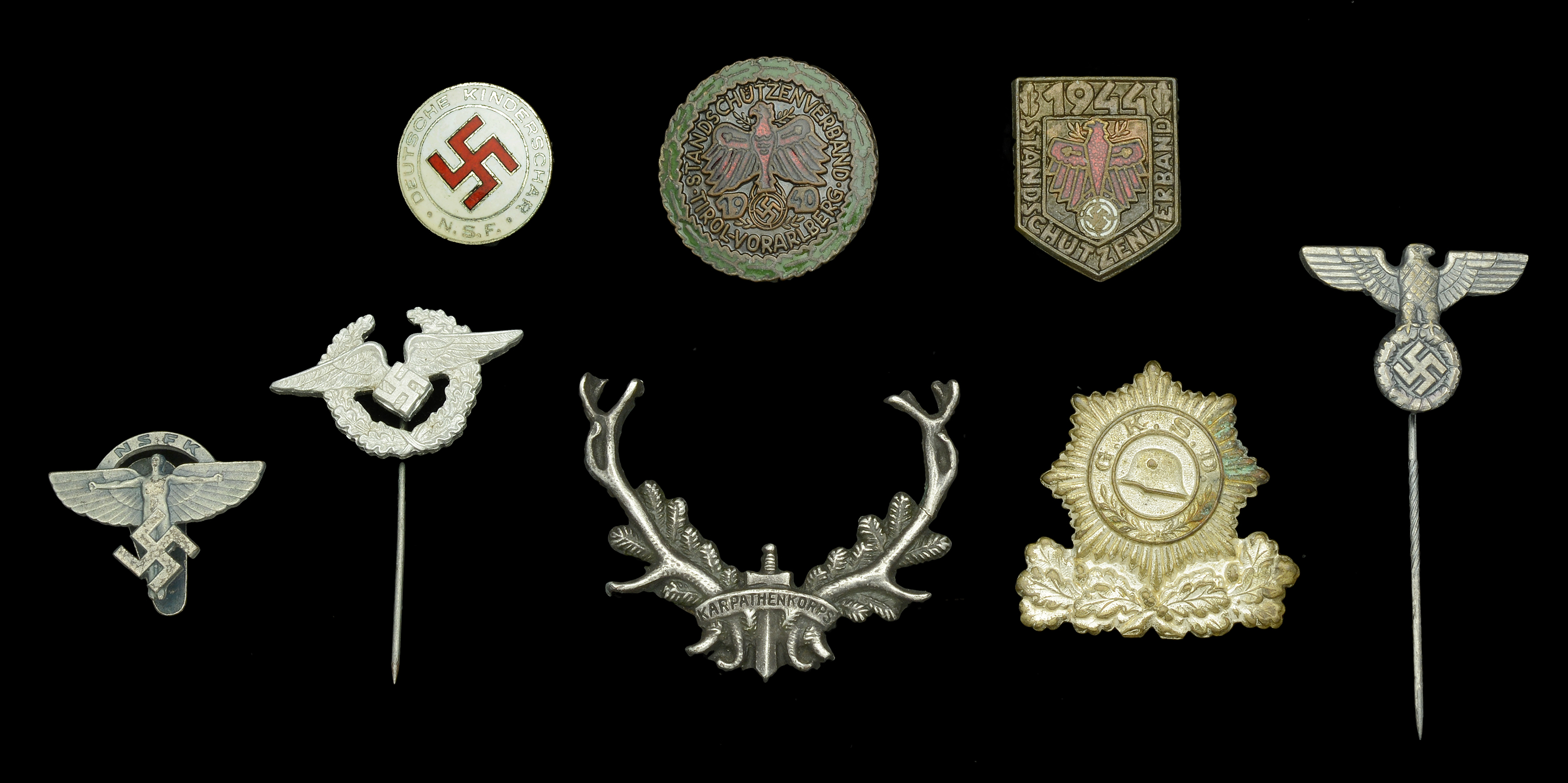German Second World War Lapel Badges. A small selection comprising a circular Tyrolean 1940...