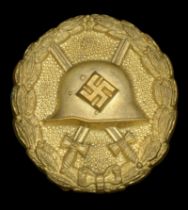 A M.1936 Spanish Civil War Wound Badge in Gold. Hollow back type, with round pin. Very sli...