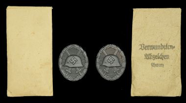 1939 Black Wound Badges in Original Presentation Packets. The first a superb quality early...