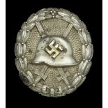 A M.1936 Spanish Civil War Wound Badge in Silver, with Maker's mark. An extremely rare vari...
