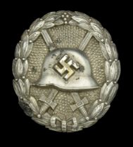 A M.1936 Spanish Civil War Wound Badge in Silver, with Maker's mark. An extremely rare vari...