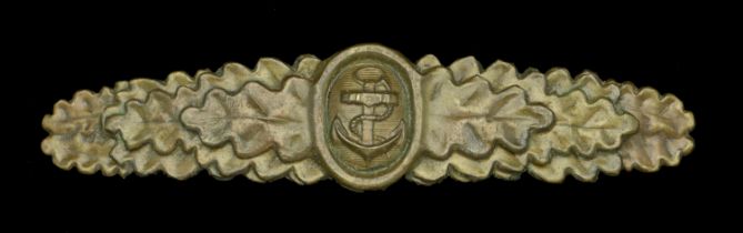 A Kriegsmarine Combat Clasp. A good-quality late War type, stamped out of brass, lead-fille...