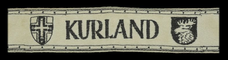 A 'Kurland' Cuffband. Soft mid-brown felt, white cotton band, and black cotton machine wove...