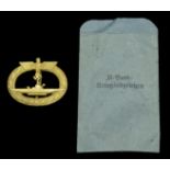 A Kriegsmarine U-Boat Badge in its Original Presentation Packet. An excellent quality early...