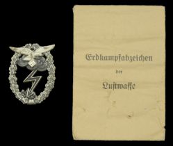 A Luftwaffe Ground Combat Badge in its Original Presentation Packet. An excellent quality e...