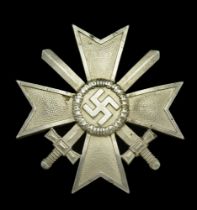 A War Service Cross First Class with Swords. An unusual convex shaped variant. Excellent qu...