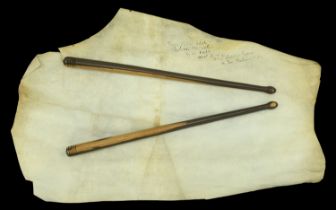 A Pair of c.1800 lignum vitea Drum Sticks. Wrapped in a large sheet of parchment on which i...