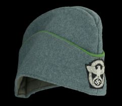 A German Police Official's Overseas Cap. A nice condition police green boat shaped style ca...