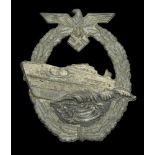 A German Second World War Kriegsmarine E-Boat Badge. A 2nd pattern E-Boat badge by Schwerin...